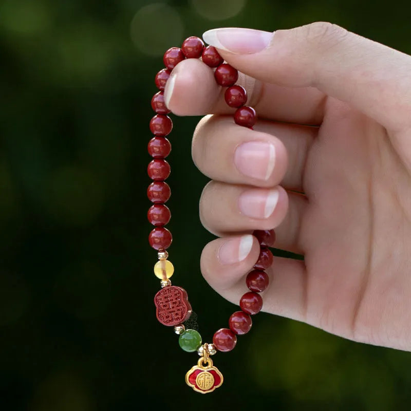 New Chinese style bracelet with emperor sandstone beads and a red Fu character charm.