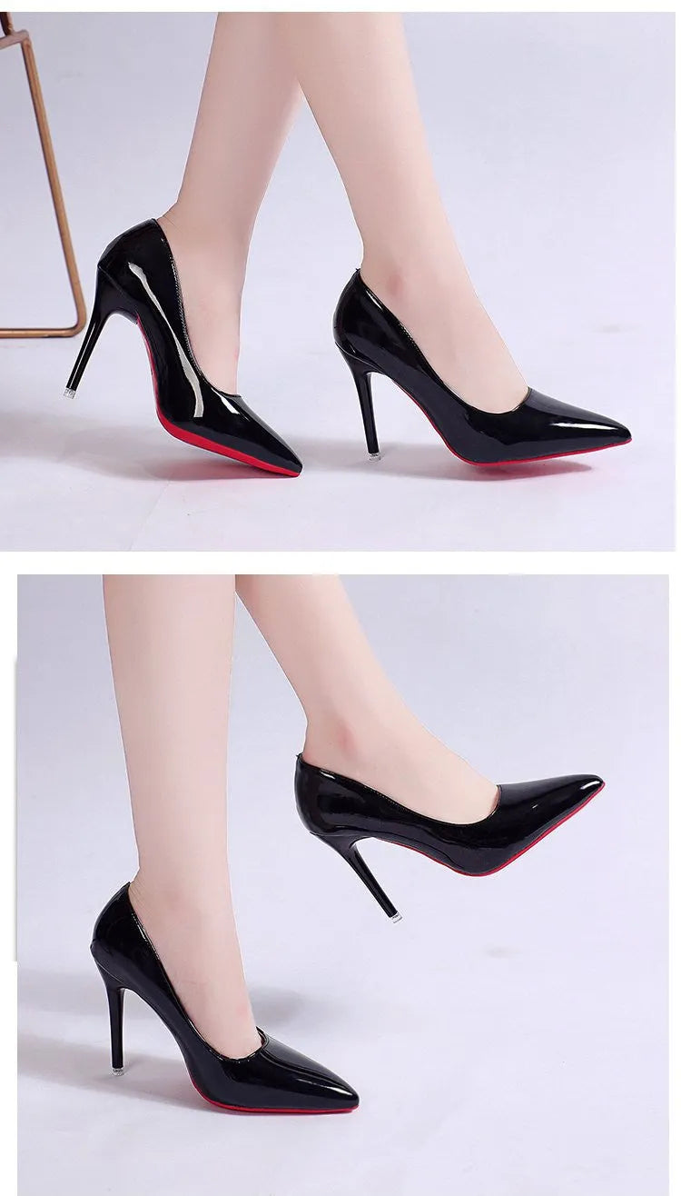 Women's black stiletto heel pump with pointed toe and shallow mouth cut on a white background.