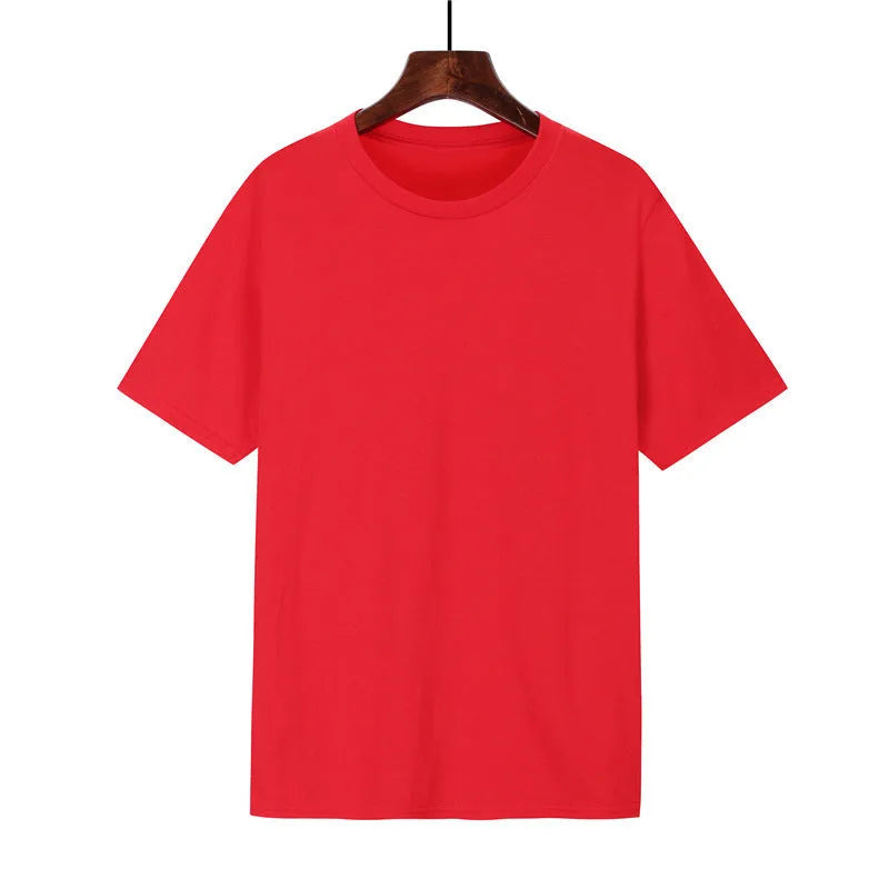 A man's loose-fitting black cotton T-shirt with short sleeves, laid flat.