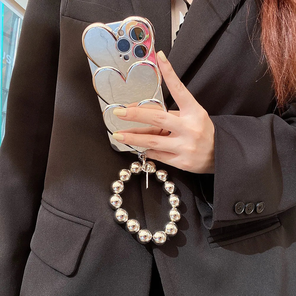 Electroplating love heart pattern iPhone case in soft TPU material on mobile phone
