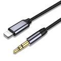 Black and silver nylon-braided 3.5mm audio auxiliary cable on a white background.