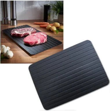 Black aluminium defrosting tray for thawing frozen meat without microwave