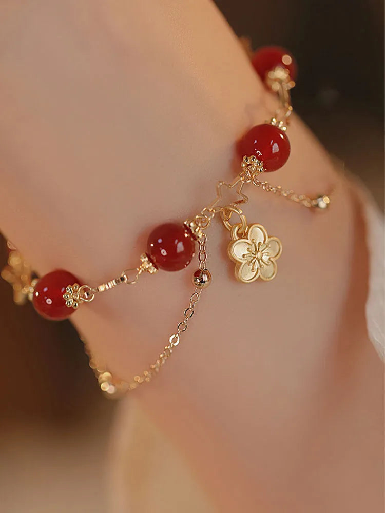 Women's red agate double layer bracelet with peach blossom design and manual processing