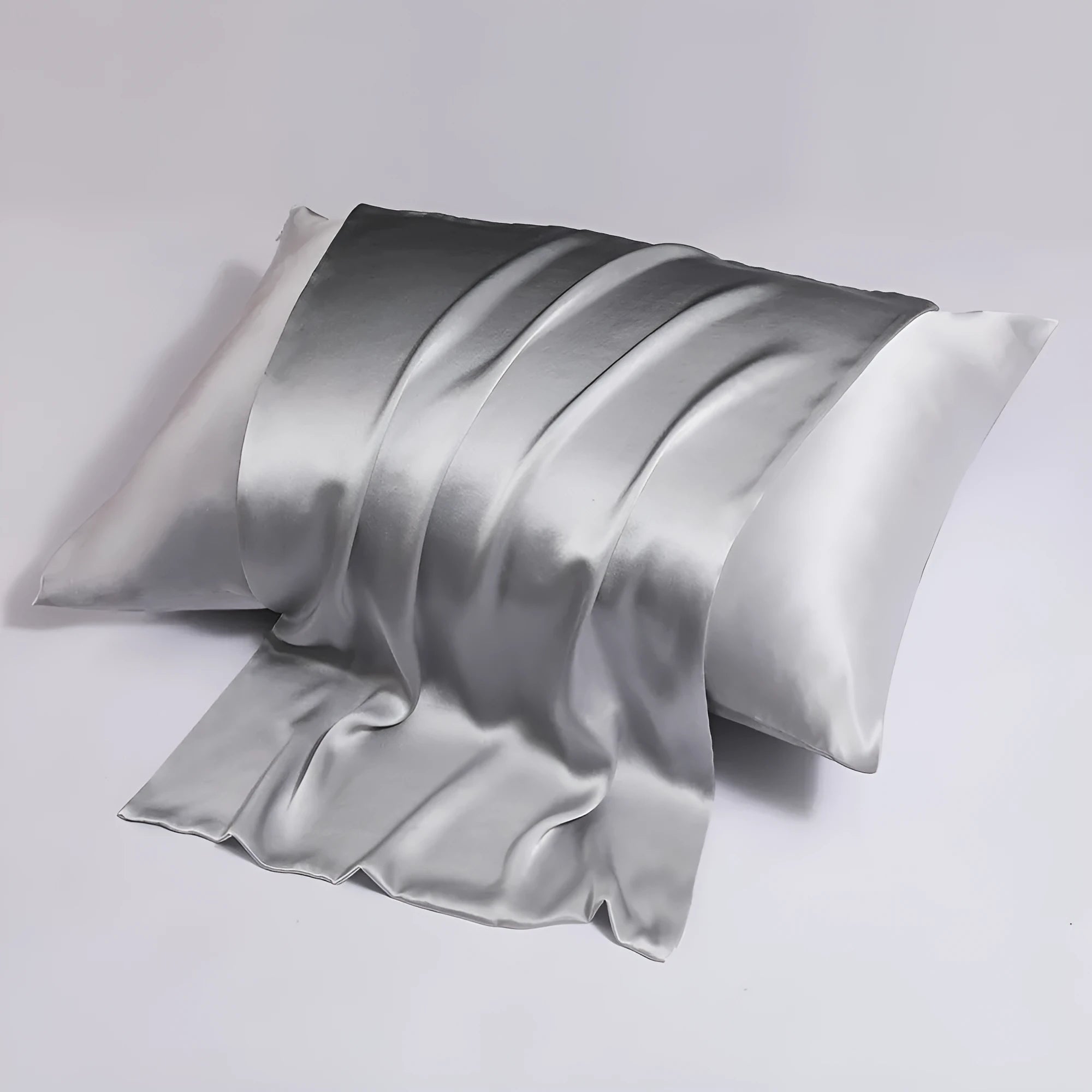 Reversible mulberry silk pillowcase with side zipper in navy blue, showing both solid colour sides.