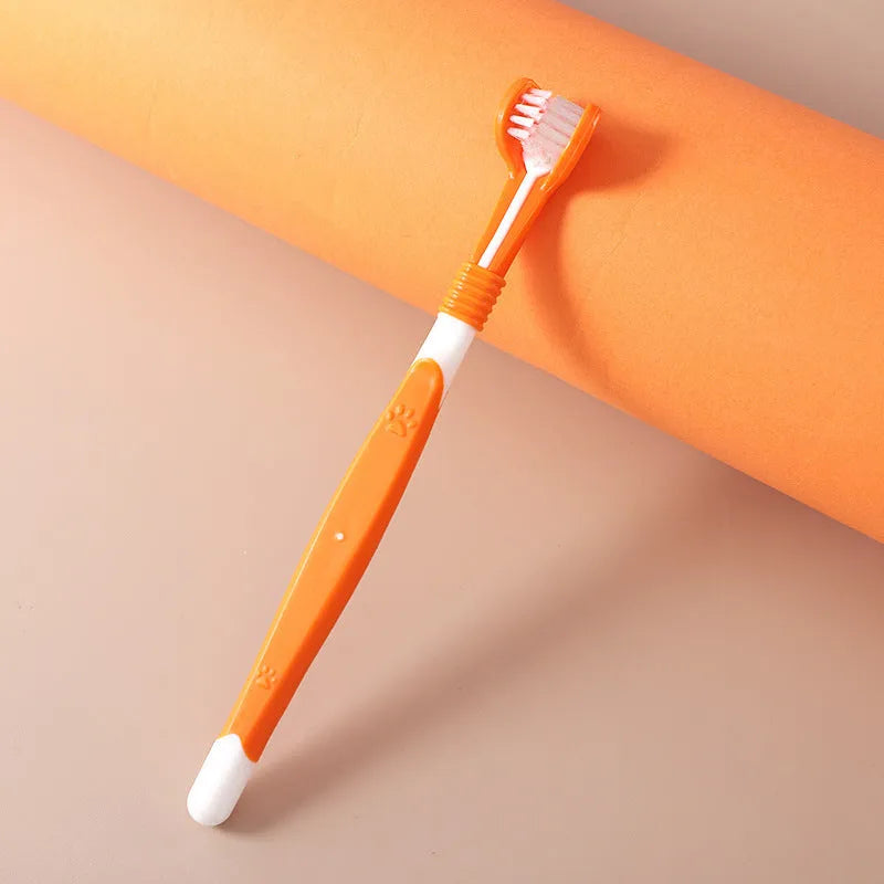 A pet toothbrush with a plastic nylon head and handle, shown in one of its available colours.