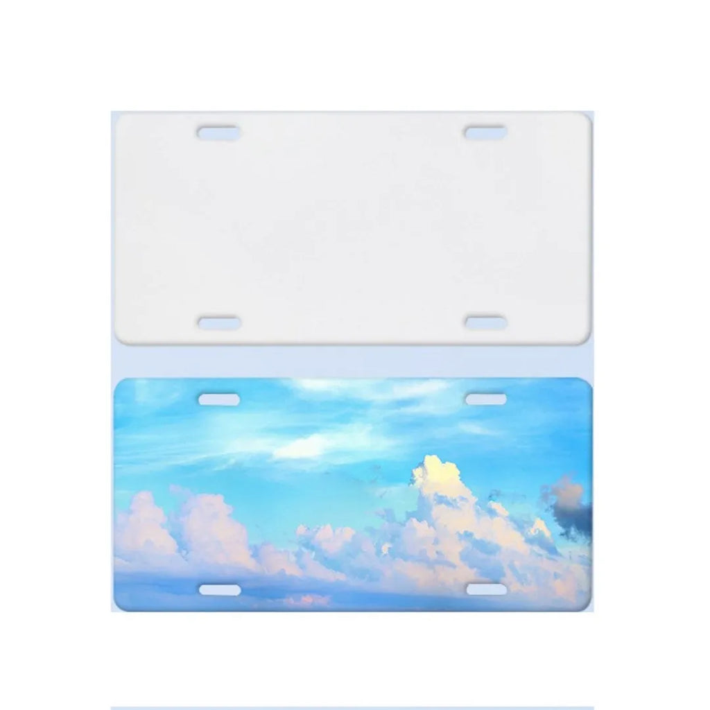 White aluminium car number plate blank measuring 30.3 by 15 centimetres.