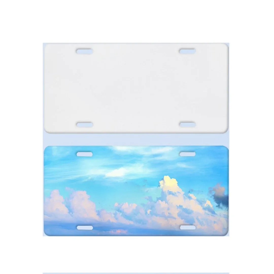 White aluminium car number plate blank measuring 30.3 by 15 centimetres.