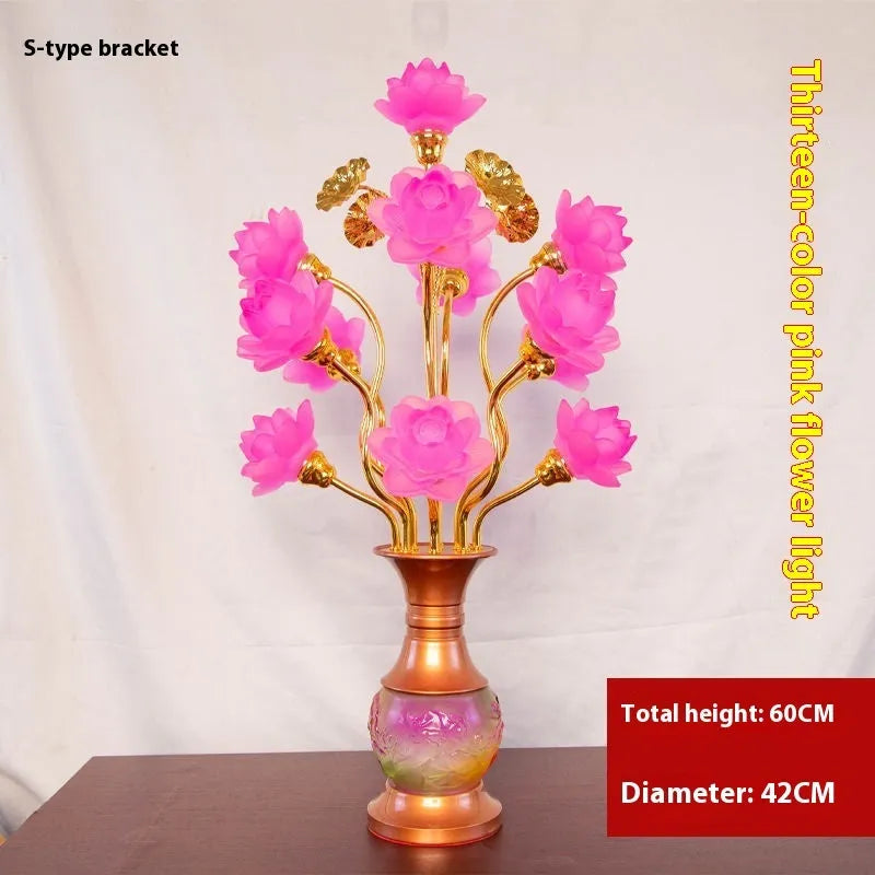 Coloured glaze pink and yellow LED lotus lantern for Buddha worship on an alloy stand.