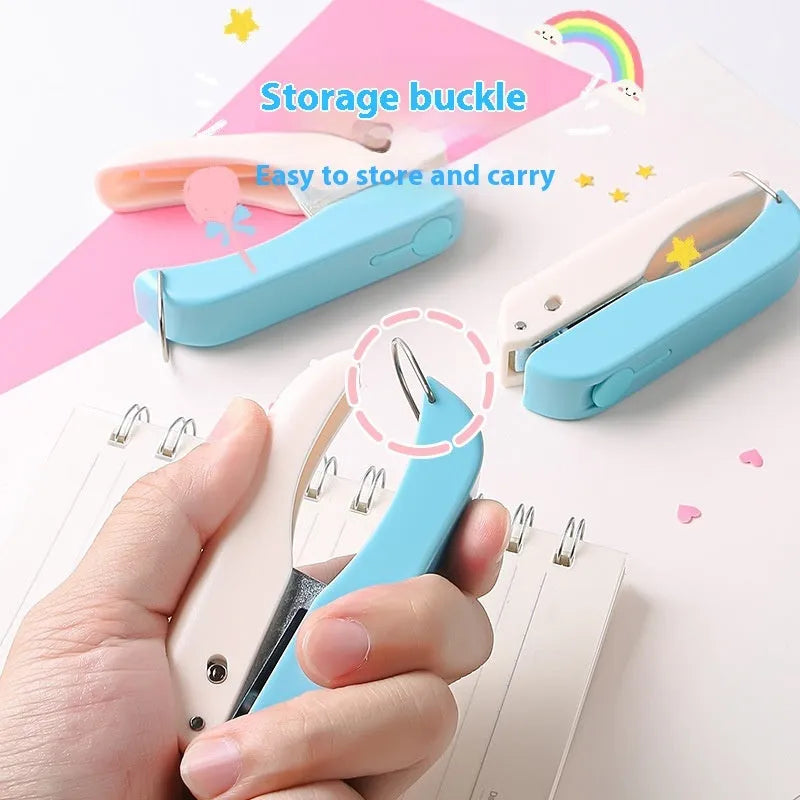 Manual hand-held punching machine for paper crafts with love, star, and round shape patterns.
