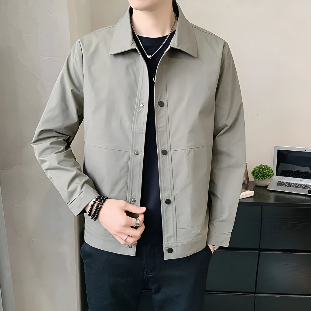 Men's Korean style single-layer lightweight jacket in blue grey, showing long sleeves and stitching detail.
