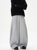Women's black wide-leg polyester trousers with mid waist and retro casual styling