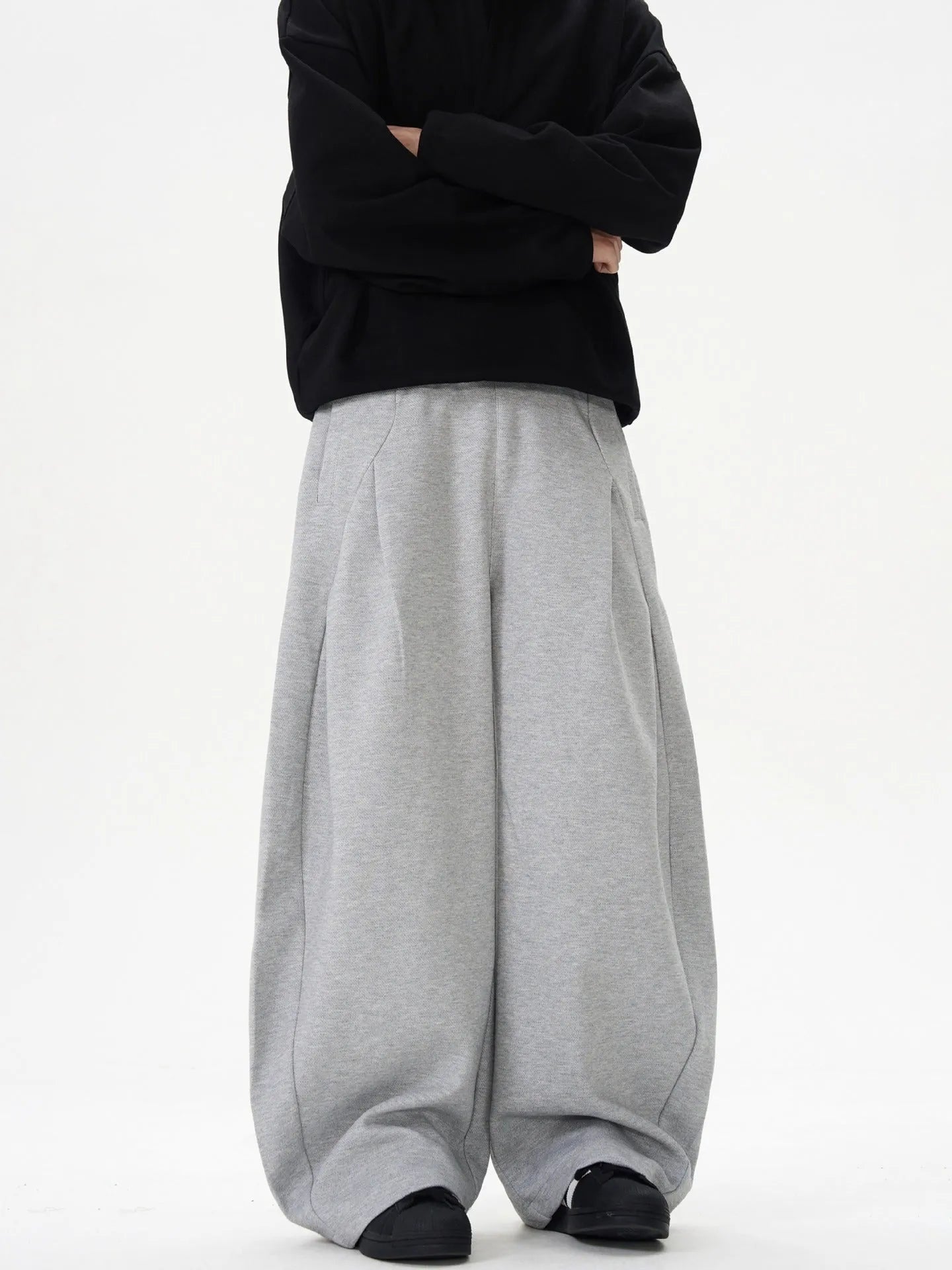 Women's black wide-leg polyester trousers with mid waist and retro casual styling