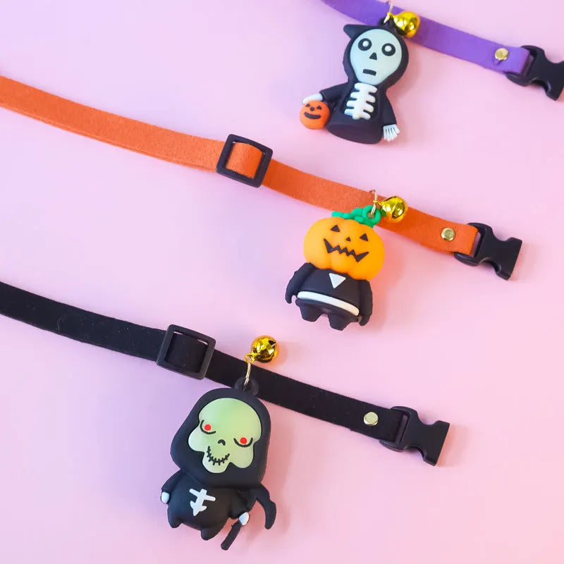 A polyester Halloween dog collar with a cartoon pattern, shown in Pumpkin Man, Luminous Kid, and Luminous Skull designs.