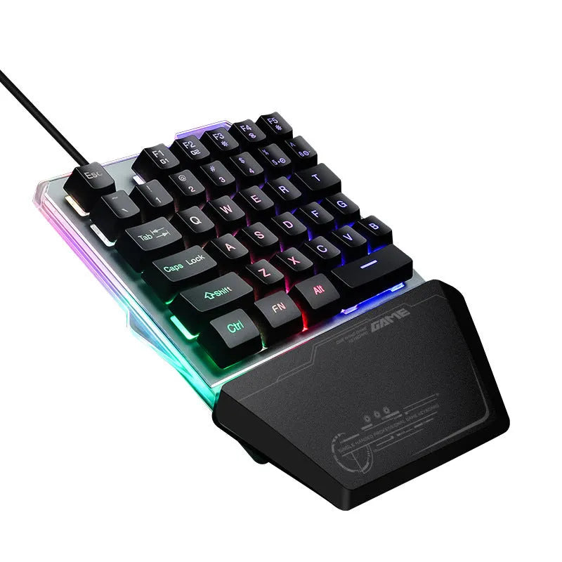 Black Robotic G40 Flow one-handed mechanical keyboard with RGB backlit keys on a desk.