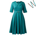 Green high waist African dress with matching belt and half sleeves on mannequin