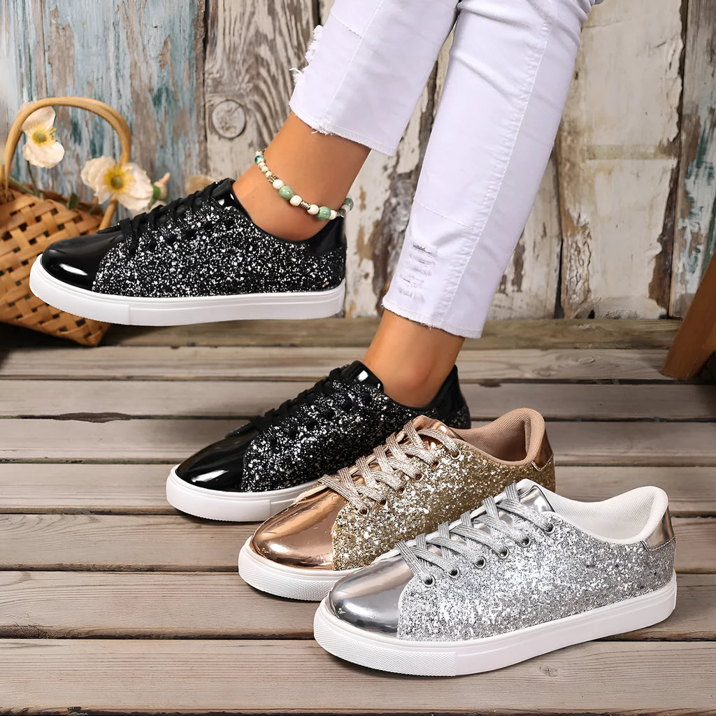 Women's plus size sequinned board shoes in black with front lace-up detail.