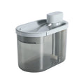 Automatic plastic drinking bowl for cats with infrared sensor, grey colour, on floor