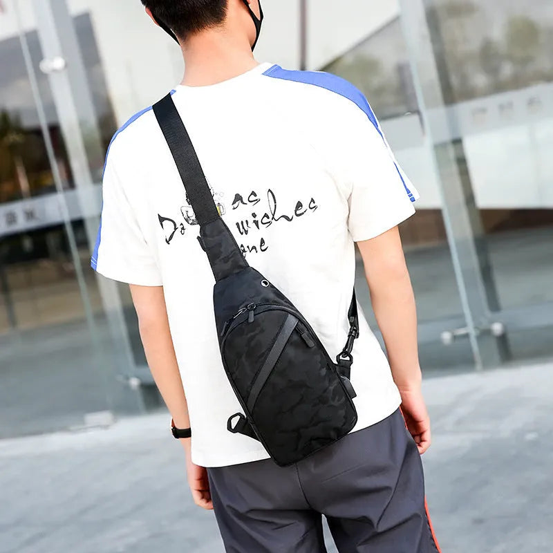 Men's camouflage crossbody chest bag with headphone hole in Camo Black
