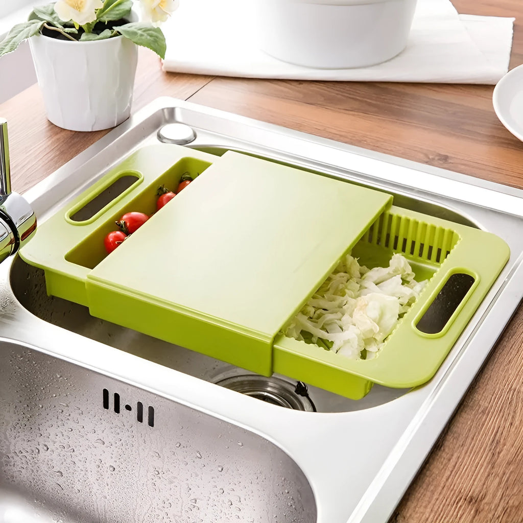 Blue kitchen chopping board with integrated drain basket for vegetable and meat preparation