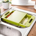Blue kitchen chopping board with integrated drain basket for vegetable and meat preparation