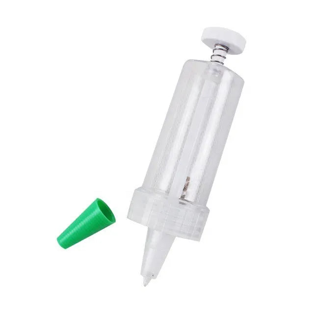 Plastic mini planter tool seeder measuring 12cm length for seed distribution in garden pots