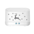 White round Elk flame effect humidifier diffuser with night light on a table.