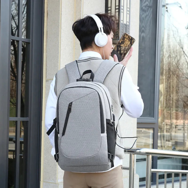 Oxford cloth computer backpack with street trend style showing 20-35L capacity and grey colour option