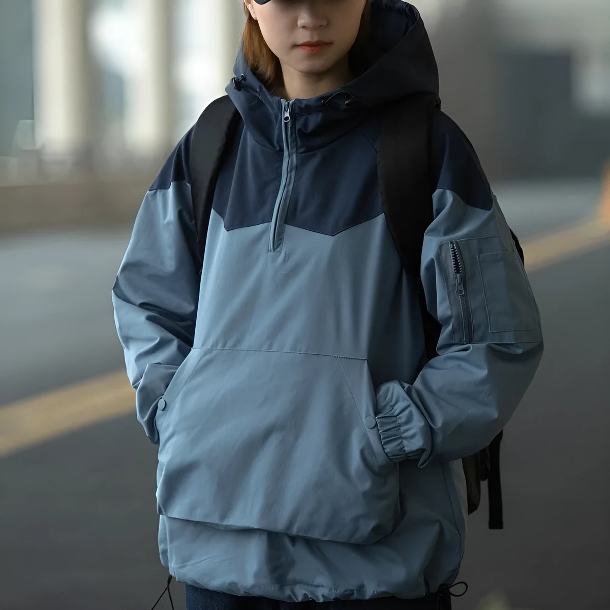 Color matching tooling hooded pullover jacket for men and women in light blue with zipper closure and loose fit