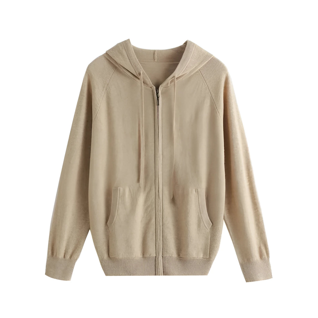 Man wearing a solid colour cashmere knitted cardigan with a zipper and hood.