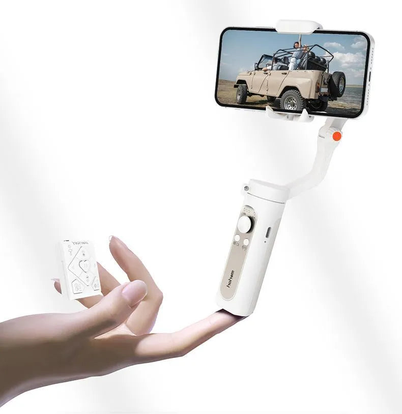 Black 3-axis mobile phone stabilizer gimbal shown in folded position next to a selfie stick.