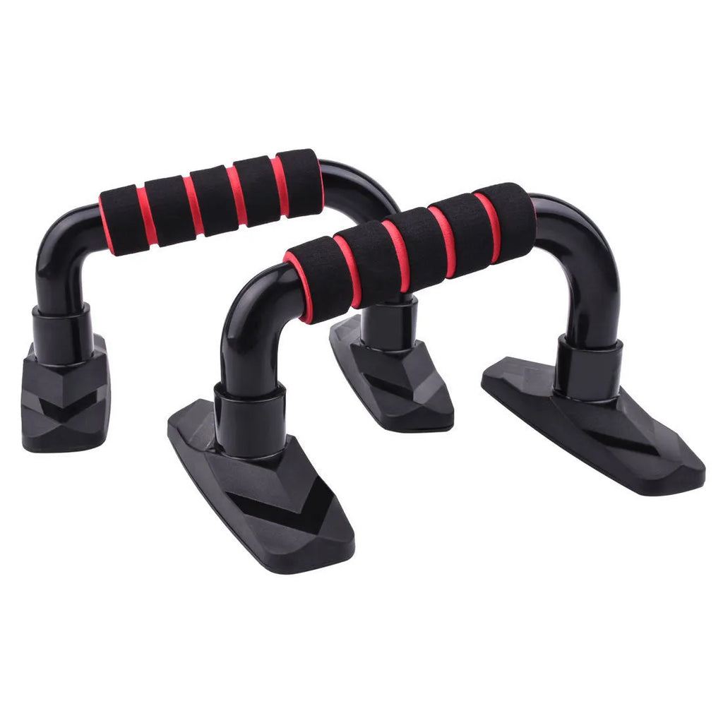 Pair of I-shaped black push up bars with grey PP sponge foam grips on a floor.