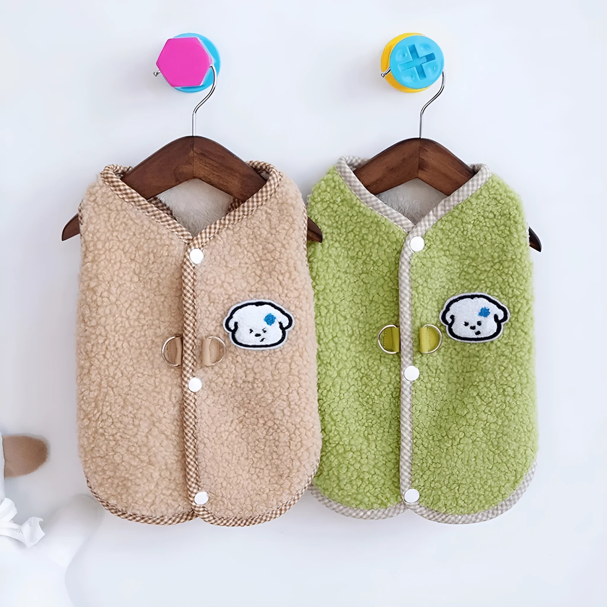 Green thickened coral fleece dog vest with a leash ring on a small dog.
