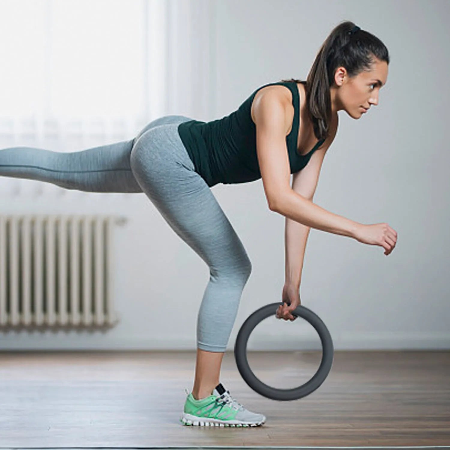 Black silicone coated iron exercise hoop 32cm diameter 4.5kg on indoor floor