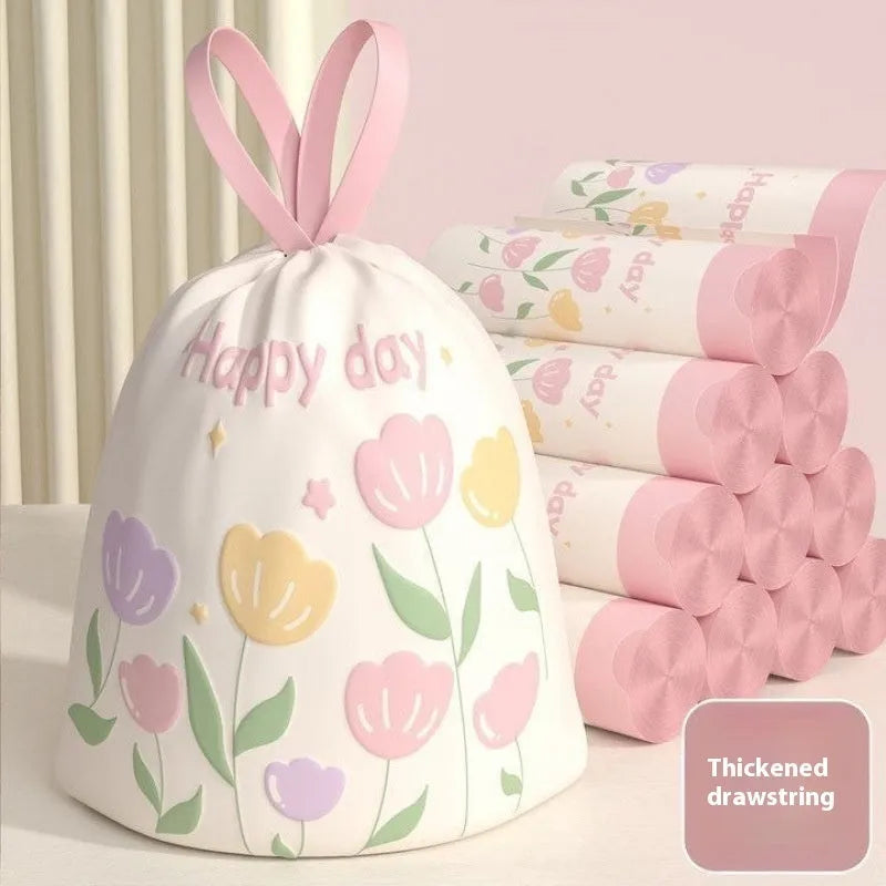 Pink degradable drawstring garbage bags with argy wormwood infusion for mosquito repellency, shown in a pack.