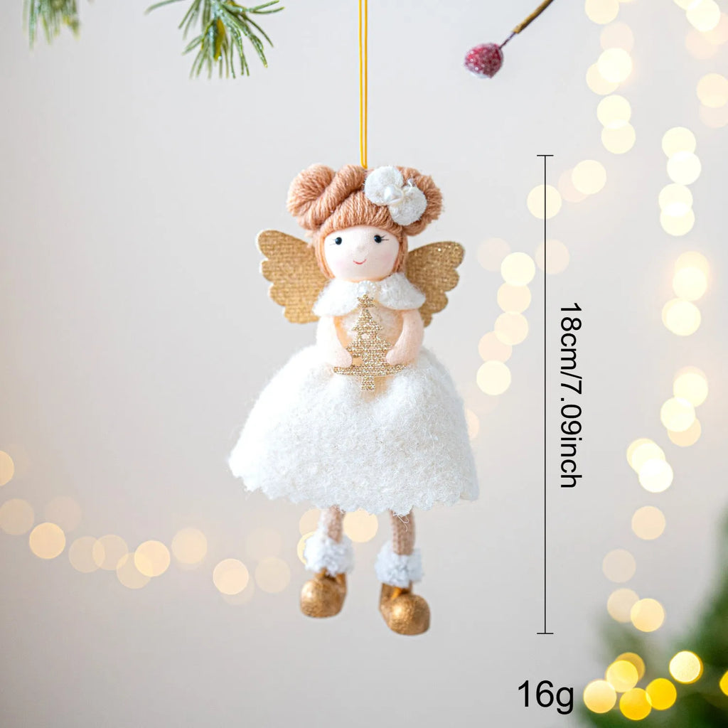 Pink and white cloth Christmas angel wings plush pendant decoration on a neutral background.