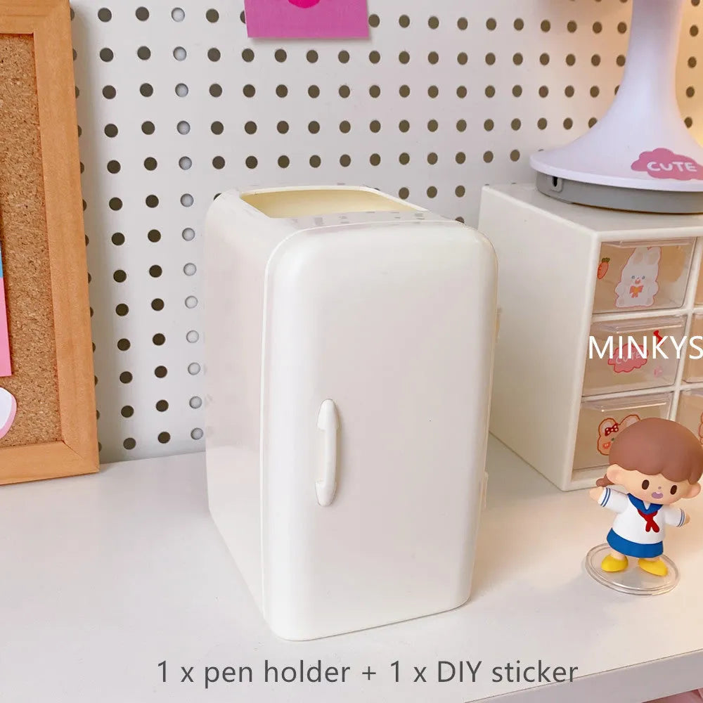 White refrigerator-shaped PP plastic pencil case with large capacity on a desk, size 10.7x9.8x7.5cm