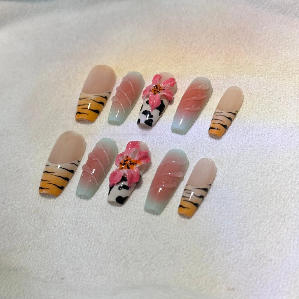 Zebra pattern lily hand carving nail art set showing embossed flower and leopard print designs