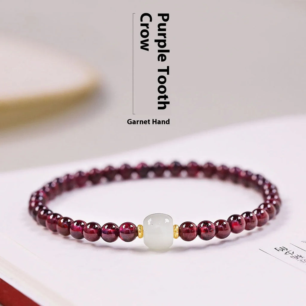 Women's garnet bracelet with U-shaped design and polished stones in 4mm or 6mm diameters
