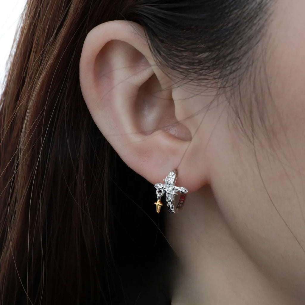 Pair of 925 sterling silver geometric cross earrings with white gold colour electroplated finish.
