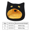 Grey cat-shaped enclosed pet bed with a round opening, sitting on a wooden floor.