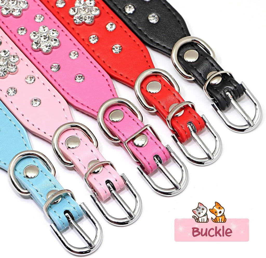A decorative black PU leather dog collar with a sparkling rhinestone flower pattern and silver metal studs, shown adjusted with a metal D-ring.