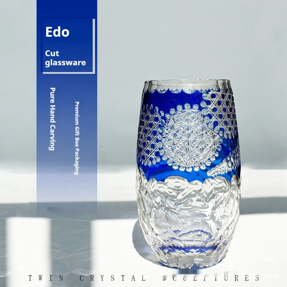Blue cut crystal glass cup 80x190mm with Japanese-Jianghu style on a table