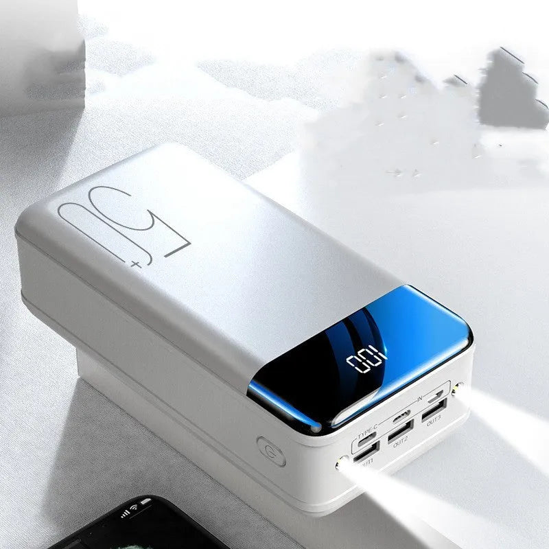 Black large capacity 50000mah portable power bank showing three output USB ports and three input charging ports on side