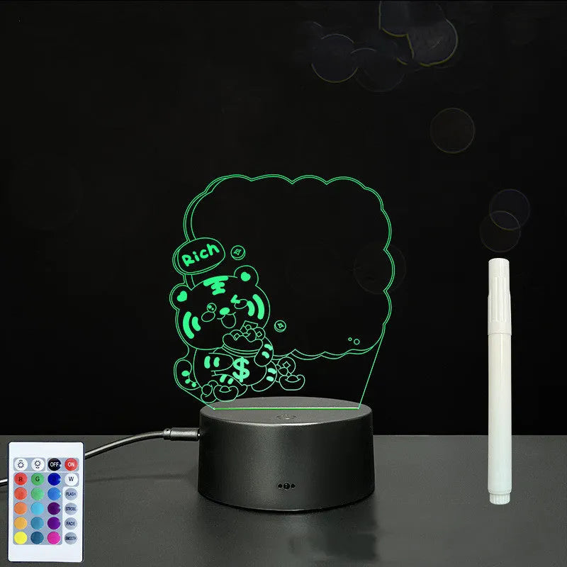 3D acrylic LED message board with touch control, black ABS base, USB cable, and stylus pen on desk