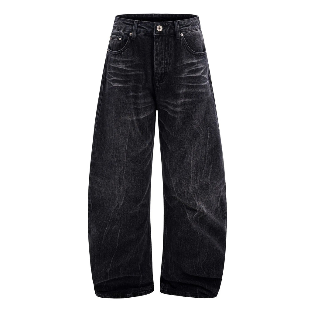 Men's black straight-leg jeans with a distressed lightning crack wash pattern on the legs.