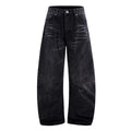 Men's black straight-leg jeans with a distressed lightning crack wash pattern on the legs.
