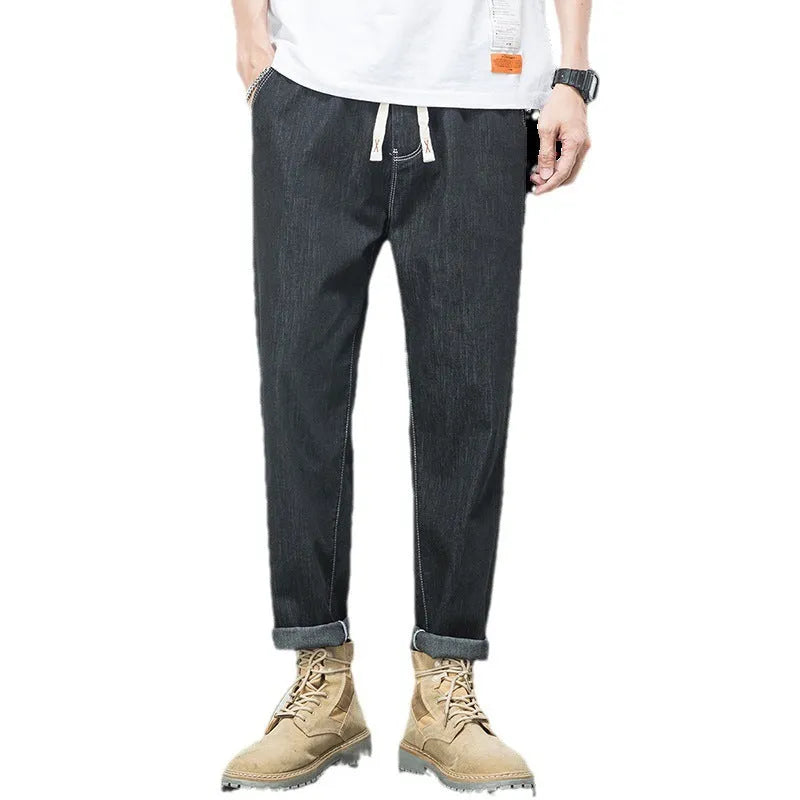 Men's loose plus size elastic waist straight leg jeans in blue denim