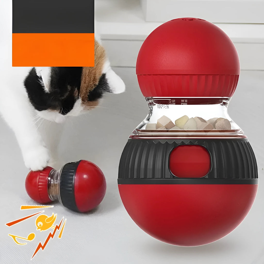 Rotating plastic cat toy with Super Ball colour scheme showing treat-dispensing openings and sound module