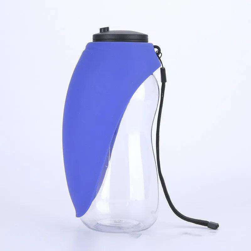 Blue plastic dog water bottle with built-in drinking bowl showing 680ml capacity and key lock mechanism