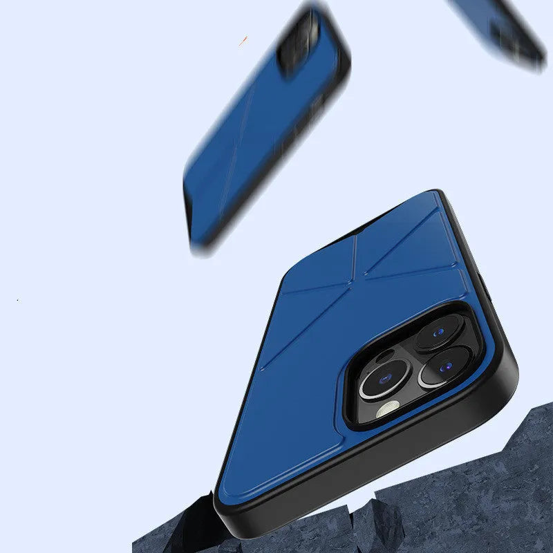 Black solid colour TPU phone case for iPhone 13, 13 Pro, and 13 Pro Max on a table.